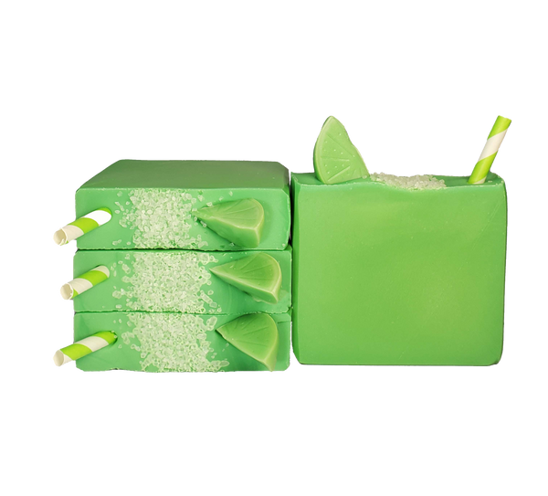 Four bars of Margarita soap. The bars are bright green and are topped with sea salt, a green and white striped paper straw, and a green wedge of soap resembling a lime.